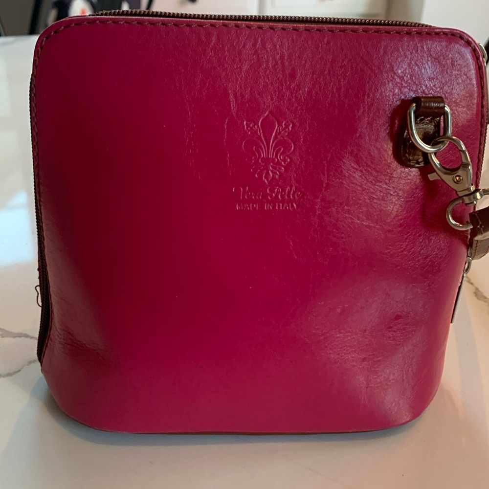 Small pink leather handbag. Purchased in Italy.